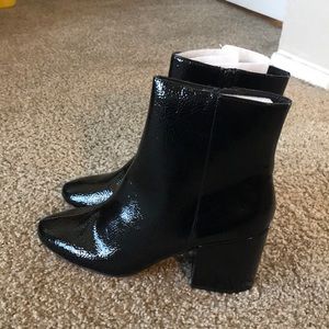Black patent leather ankle boots